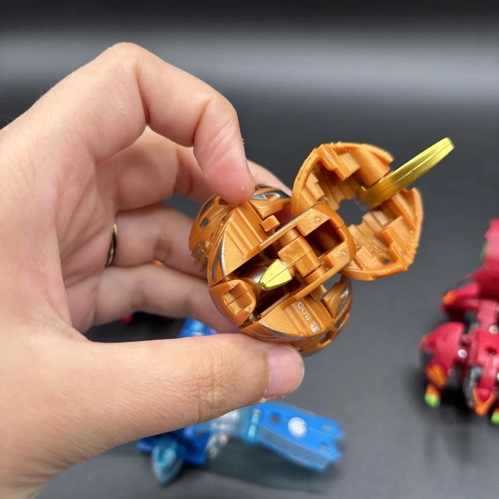 Lot Of 9 Bakugan Figures And 23 Bakugan Cards/Metal Card